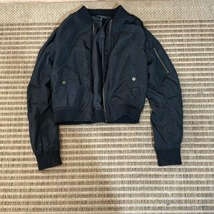 I am selling a black kids jacket size medium the brand is Romeo +Juliet couture